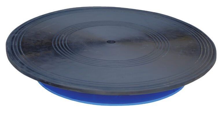 The Vestil Turntable features a 24-inch diameter and is stylishly designed with concentric circle patterns on its black surface, supported by a blue curved base that stands at 3.687 inches high, efficiently handling loads up to 0.5K.