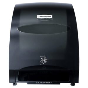 The Kimberly-Clark® Automatic Paper Towel Dispenser - Black (16W x 13H x 10D) features a stylish design with a transparent view, enabling easy towel supply checks. A hand icon assists users for smooth automatic dispensing, promoting seamless hygiene.