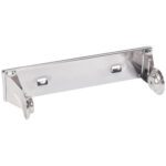 The MH-USA Chrome Perforated Roll Towel Dispenser, wall-mounted, complements a stainless steel door stopper with sleek designs and shiny finishes. The stopper features mounting holes on its flat section for easy installation.