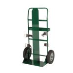A green metal hand truck, designed like a Little Giant Gas Cylinder Partition Wall Truck, includes a tall back frame, large wheels, and multiple securing straps. Perfect for transporting heavy or bulky items securely, it stands upright on a white background.