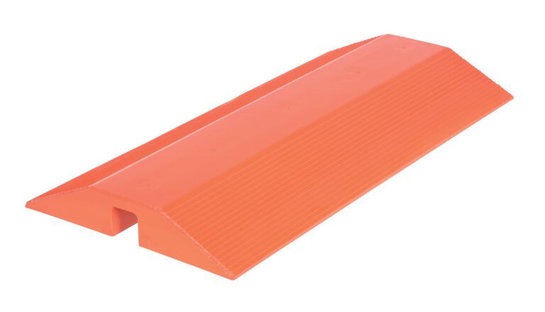 A vibrant orange plastic speed bump, inspired by the Vestil Urethane Cable Crossover 24Lx48W, features a grooved surface and trapezoidal shape with a hollow underside to enhance road safety by slowing vehicles effectively.