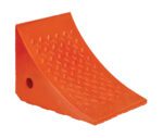 The orange Vestil Urethane Wheel Chock 8 X 11 X 8 features a curved, textured surface for optimal grip and a side hole for easy handling, effectively preventing vehicle movement.