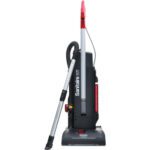 The Sanitaire® MULTI-SURFACE QuietClean® Upright Vacuum boasts a chic black and gray body, vibrant red handle, detachable hose, and the prominent Sanitaire logo, promising efficient cleaning on multiple surfaces.