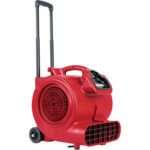 The Sanitaire® DRY Time™ Portable Blower with Handle offers functionality and convenience in a red cylindrical design, featuring retractable wheels, a large front vent, and a top control panel for easy operation and transport.