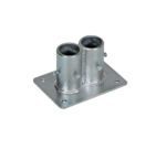 The Vestil Steel Double Socket W/O Toeboard features a flat base and two cylindrical holders with screws for secure pipe mounting. Its metallic surface offers a shiny, industrial finish for durability and style without requiring a toeboard.