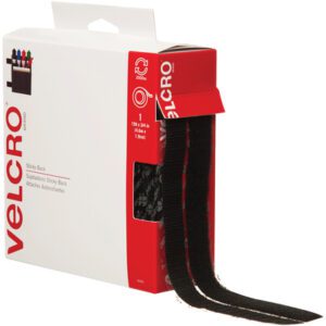A partially extended roll of 3/4 x 15 Black VELCRO® Brand Tape from the Combo Packs line, featuring mostly white packaging with red accents and the prominent Velcro logo.