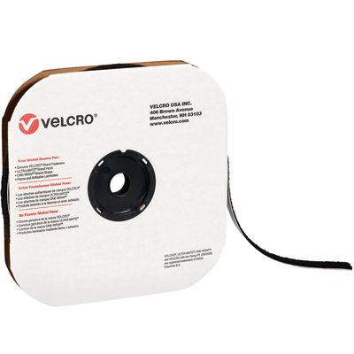 VEL107.jpg A roll of 5/8 x 75 Black VELCRO® Brand Tape - Hook, with a white and brown cardboard holder featuring the Velcro logo and company details. One end of the tape is extended, ready to use.