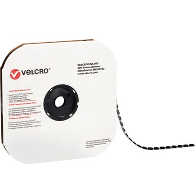 VEL128.jpg A spool of 7/8 Black VELCRO® Brand Tape, featuring individual dots, sits on a cardboard holder partially unraveled. The Velcro logo and company address are printed on the cardboard.