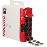 A red and white box of the 3/4 Dots - Black VELCRO® Brand Tape showcases partially pulled out black dots, emphasizing their size and shape, and highlights it as a combo pack containing 200 fasteners.