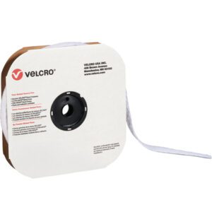 The 1 1/2 x 75 white VELCRO® Brand hook tape, partially unrolled to reveal the core, is housed in a convenient cardboard dispenser with a protective cover featuring company details and a red logo.