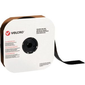 A spool of 4 x 75 Black VELCRO® Brand Tape - Individual Strips with hook fasteners is partially unwound, housed in a cardboard box featuring the Velcro logo and company details.