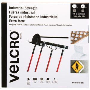 The 1 x 50 White VELCRO® Brand Tape Combo Pack features sleek black and white packaging, highlighting product details in English, Spanish, and French. Images show its industrial strength for holding brooms or caution signs, with dimensions prominently displayed at the top.