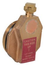 The Vestil Horizontal Drum Vent for 30 & 55-gallon drums includes an industrial brass safety valve with a warning label: Caution This Side Up. Instructions state: Lift Knob to Vent. The model number, Vent-H, and a website URL are also clearly shown.