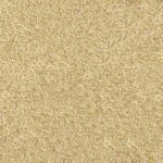 Close-up of MH-USA Vermiculite 2A - Medium carpet featuring a textured, light beige color with a dense pile. The surface looks soft and plush with slight shading variations, creating a subtle pattern.