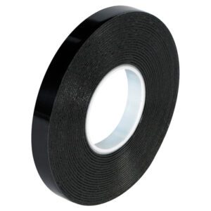 A roll of 3/4 x 5 yds. Black 3M™ 4949 VHB™ Tape with a white core is shown at an angle on a plain white background. Its glossy surface subtly reflects light, and the tape is wound neatly.