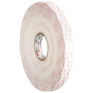 A large roll of thick, double-sided 1/2 x 5 yds. white 3M™ 4950 VHB™ tape with prominent red text and 3M branding on the surface is tightly wound, showcasing its impressive width and adhesive.