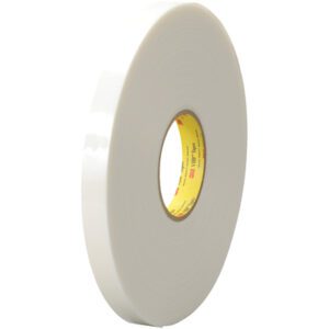 A large roll of 3/4 x 5 yds. White 3M™ 4951 VHB™ Tape (1 Roll/Case) with a yellow interior core, flaunting a smooth, glossy texture, is positioned upright against a plain background.