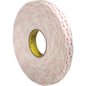 The 1 x 5 yds. White 3M™ 4955 VHB™ Tape comes in a large roll with a white look, iconic red branding on a yellow spool, and is showcased upright to highlight its thickness and durability.