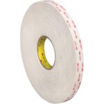 An upright 3/4 x 5 yds. White 3M™ 4955 VHB™ Tape (1 Roll/Case) with red brand text sits against a white backdrop, exemplifying reliable bonding.