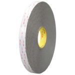 The 1 x 5 yds. White 3M™ 4959 VHB™ Tape (1 Roll/Case) is displayed, featuring a red text adhesive backing, gray tape, and yellow core that enhances branding for versatile applications.
