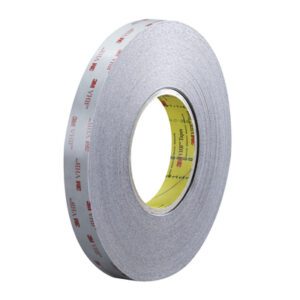 A 3/4 x 5 yds. roll of black 3M™ 5915 VHB™ Tape, featuring a glossy finish and 3M VHB marking, displays the brands red and yellow logo on its inner core.