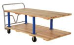 The Vestil Double Deck Hardwood Platform Cart 36X72 has a natural wood finish, blue metal supports, and a sturdy handle. Its two-tiered design and four wheels make it ideal for efficient item transport in warehouses or large areas.