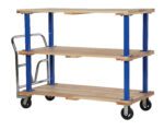 The Vestil Triple Deck Hardwood Platform Cart 30X60 offers three shelves on a blue metal frame, equipped with a metal handle and four black wheels, combining functionality and industrial style for easy movement.