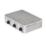 The Vestil Cast Aluminum Dolly 9000 Lb 12.5L X 8.5W features a metallic, diamond-patterned surface with three round black knobs on one side, reflecting light and highlighting its textured design and impressive strength up to 9000 lb capacity.