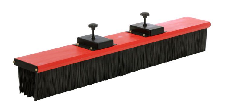 The Vestil Fork Truck Mounted Sweeper W/60 In Brush includes a large red and black broom with two adjustable knobs, ideal for sweeping extensive areas with its long, dense bristles suited for heavy-duty cleaning.