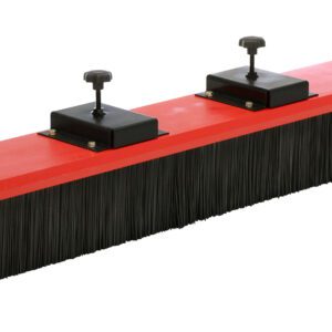 The Vestil Fork Truck Mounted Sweeper W/60 In Brush includes a large red and black broom with two adjustable knobs, ideal for sweeping extensive areas with its long, dense bristles suited for heavy-duty cleaning.