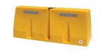The Vestil Traffic Barriers 5 Ft Wide Yellow Strip feature a vivid yellow strip, two rectangular reflective panels on top, a central joining point, and a small circular hole in the bottom corner for convenience.