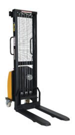 The Vestil Stacker DC Winch Fixed, with its yellow body and black handles, features dual forks, a vertical mesh guard, and wheels for easy movement. Its fixed design is perfect for efficient pallet lifting and transport.