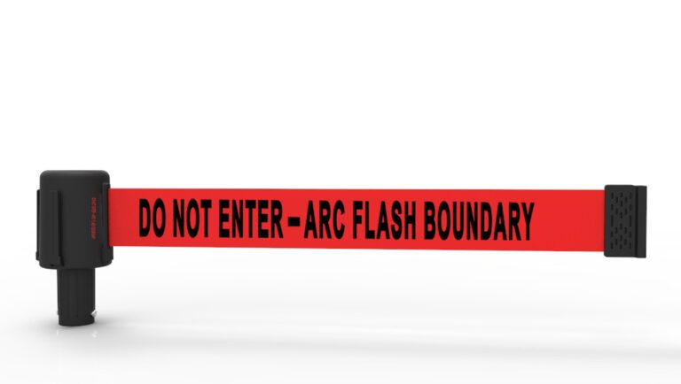 A red Vestil Web Barrier Retractable Arc Flash Banner is stretched between two posts, featuring bold black DO NOT ENTER - ARC FLASH BOUNDARY text on a crisp white background.