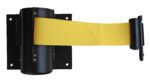 The Vestil Wall Mounted Guidance Barrier 6 Ft has a yellow belt that extends from a black wall-mounted base, secured with visible screws.