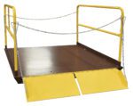 The Vestil Prem Truck Scissor Dock Lift 5K 7X8 Ft features a brown textured metal platform with yellow side railings and secure chains, designed for easy loading and unloading. It includes two accessible yellow ramps on one side for optimized functionality.
