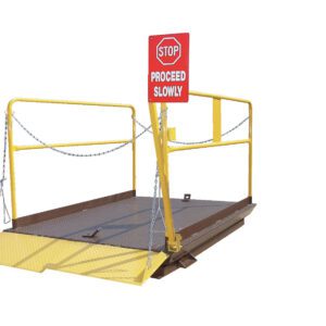 The Vestil Dock Lift Optional Stop Sign Signal includes yellow metal railings and chains, a red STOP PROCEED SLOWLY sign, an angled textured platform for secure footing, and a signal-ready design on a white background for an efficient workspace.