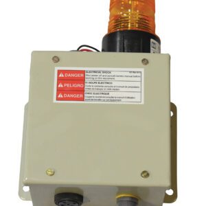 The Vestil Dock Lift comes with a beige box featuring red and white warning labels in English and Spanish, an orange cylindrical light on top, a black dial, metal connector, and the option for a beeper & strobe to enhance safety against electric shock and danger.