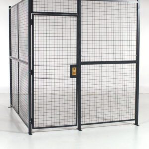 The Vestil Hinged Door No Ceiling Cage 3 Sided 8X8 is a black-framed metal wire mesh enclosure with a grid pattern and secure latch, ideal for storage and security in well-lit rooms.