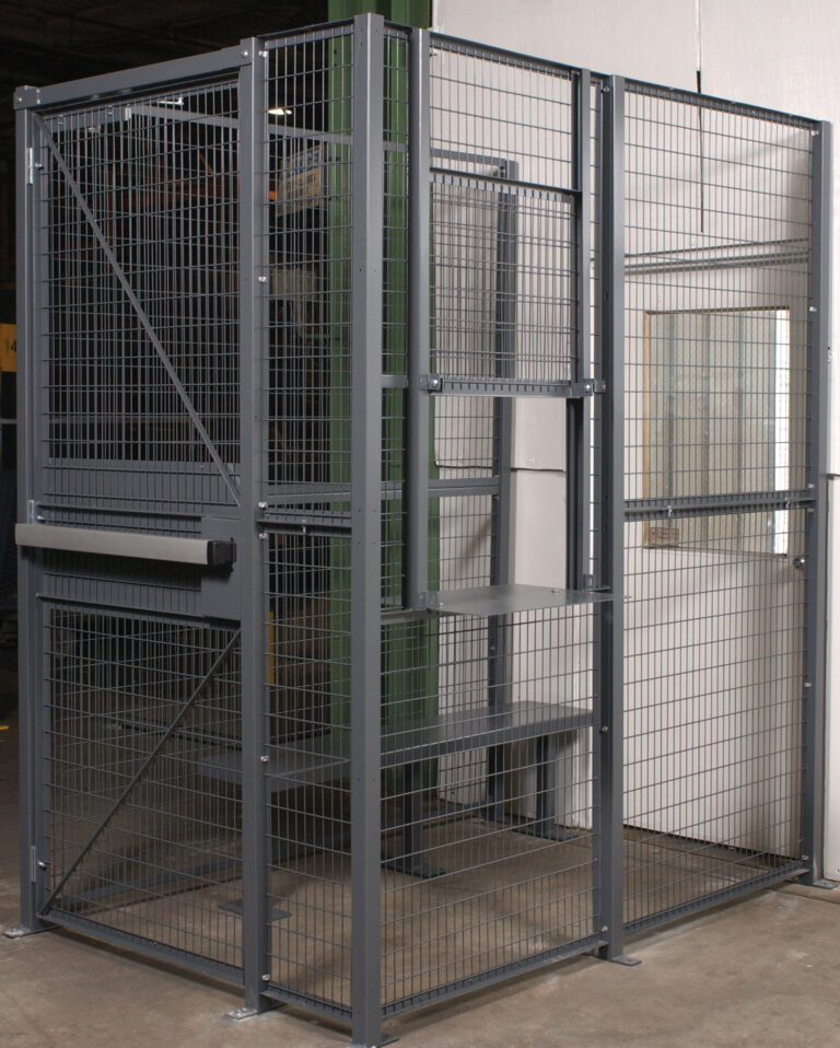 WPC-D-4X6-3_A.jpg The Vestil Driver/Trucker Access Cage 3 Sided 4X6, set against a white wall, features a sturdy steel frame and lockable door. Ideal for secure storage in warehouses or industrial areas, this metal mesh cage includes practical shelves.