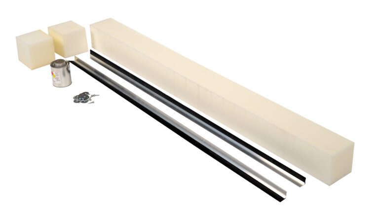 Assorted materials include two large rectangular foam blocks, two smaller square foam pieces, a Vestil Stripping Replace 1 In Brush 110 In Pit, two long metal rods, a small can, and several screws arranged on a plain white background.