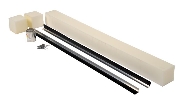 The DIY kit includes three foam blocks, two long black Vestil strips, a small tin, and washers on a plain white backdrop. Ideal for easy project replacements or improvisation with the Vestil Stripping Replace 1.5 In Brush 50 In Pit.