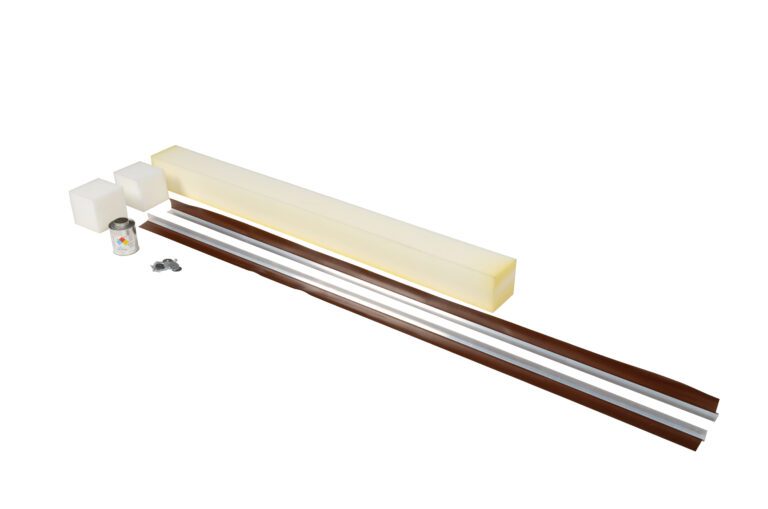 An organized set on a white background features long rods, two foam blocks similar to weather strips, a can of liquid, and small metal pieces. These items are parts of the Vestil Weather Strip Replace Vinyl 85 In Pit maintenance kit.