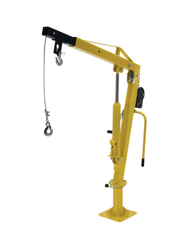 The Vestil Winch Operated Truck Jib Crane 500 Ext is a yellow mini crane with a base plate, adjustable arm, and manual winch. It has a steel cable ending in a hook for lifting and moving loads and includes an operational handle for convenience.