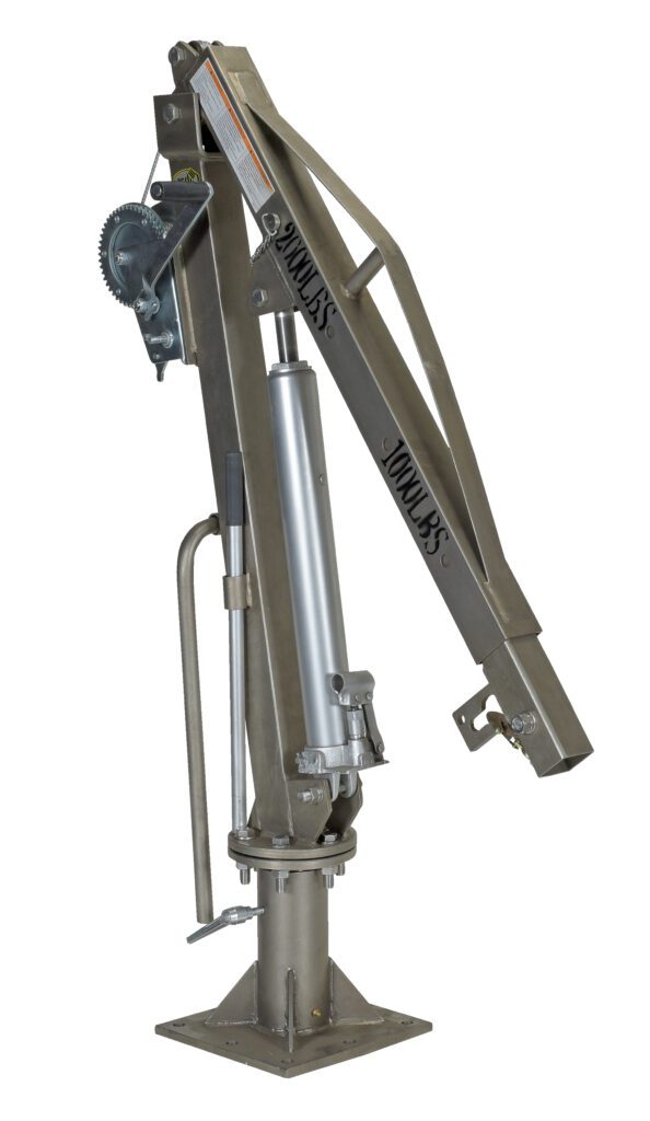 WTJ-4-SS_A.jpg The Vestil Winch Truck Jib Crane 1K Extended Ss is a metallic lifting device with a pivot point, hydraulic cylinder, and gear mechanism. Mounted on a base featuring branding text, its designed for industrial and mechanical use.