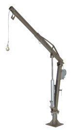 The Vestil Winch Truck Jib Crane 1K Extended Ss includes a metal crane arm with a hook, a hydraulic cylinder, and manual winch. It is mounted on a sturdy base for lifting heavy objects, with the arm extended and slightly angled upward for optimal reach.