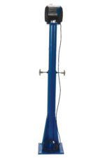 A tall, blue metal pedestal grinder stand with a top-mounted motor, echoing the robust Vestil Ac Power Jib Crane series design. It features a power cord and adjustable side knobs, with a sturdy base for industrial use.