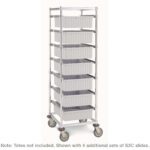 The Metro APT1C-5MP Adjustable Single-Bay Tote Rack, measuring 26 x 20.625-29.375 x 68, features six gray plastic bins vertically arranged and includes polyurethane casters for easy mobility; totes not included, shown with four extra S3C slide sets.