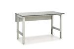 A metal workbench featuring a flat gray tabletop and an adjustable frame emphasizes ergonomics in lab design. The legs have leveling feet, and its simple, industrial look makes it suitable for workshops or garages.
