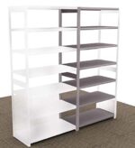 The Aurora Quik-Lok Shelving Open Storage Add-On Unit features six openings, stands 76 tall, and has an 18 depth. Available in crisp white and sleek dark gray, it complements a room with patterned beige carpet.