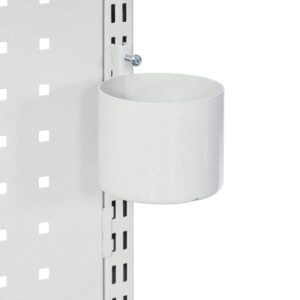 A metal cup holder is attached to a perforated white panel. The holder is cylindrical, and secured with a screw to the panel. The panel has a grid of square holes, and the cup holder is positioned near the edge.
